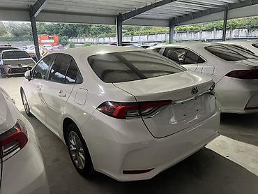 corolla 2022: Toyota Corolla: 2021 г., 1.8 л, Вариатор, Гибрид, Седан — 2