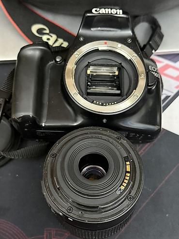 свет для видеосьемки: Зеркальная фотокамера Canon EOS 1000D (Rebel XS) с комплектным — 1