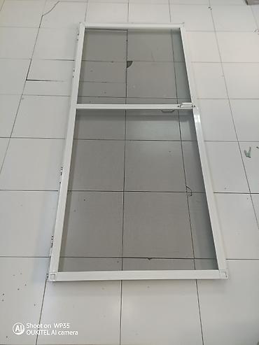 Qapı setka aliminum çərçivə daxilində. Uzunluğu 216sm eni 96 sm normal