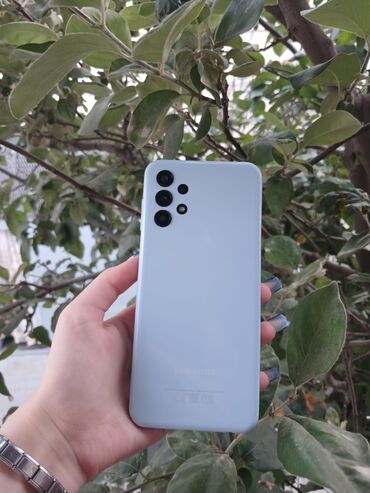Samsung Galaxy A13, 128 ГБ, цвет - Голубой, Сенсорный, Отпечаток пальца, Face ID