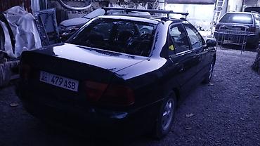 машина на кридит: Mitsubishi Carisma: 1997 г., Автомат, Бензин — 4