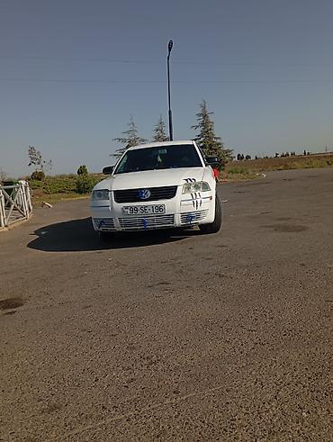 volkswagen polo v: Volkswagen Passat (B5) sedan – ağ rəngli, 4 qapı, önlü-arxalı geniş — 1