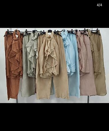 ceo set: Damski komplet – bluza bez rukava sa volanima + široke pantalone. - — 4