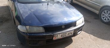 вит авто: Mazda 323: 1998 г., 1.5 л, Автомат, Бензин, Седан