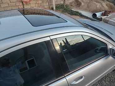 mercedes motor yağları: Mercedes-Benz C-Class sedan (W203), gümüş rəng. Xüsusiyyətlər: - — 3