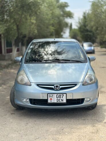 мини электро машины: Автомобиль Honda Жаз голубого цвета, компактный хэтчбек с передним