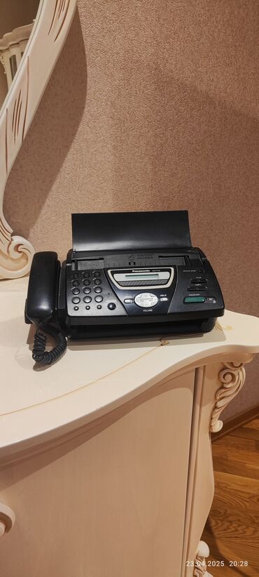 qapaqlı telefonlar: 30azn .Faks aparati ve telefon. Istifade olunub. yaxshi veziyyetdedi