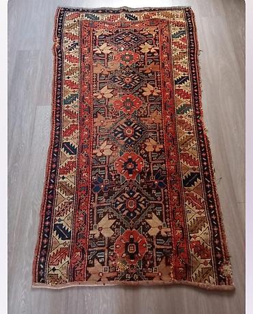 140 ilin Qarabag xalcasi. Qədim üslubda əl
