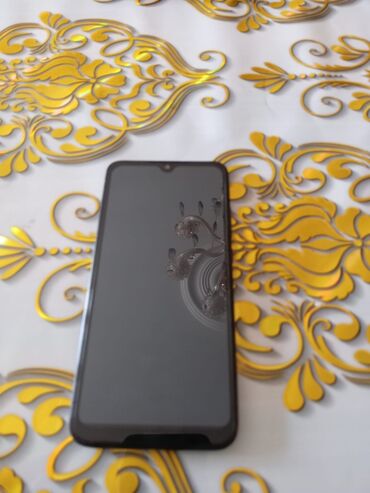 Xiaomi Redmi 7, 32 GB, rəng - Qırmızı, 
 Barmaq izi