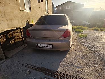 124 e500: Kia Spectra: 2004 г., Бензин, Седан — 1