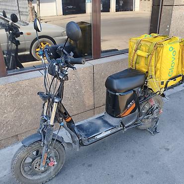 surron light bee: Электроскутер для курьерской доставки Описание: - Компактный — 1
