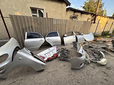 Защита радиатора: Разбор Toyota Corolla (E140/E150), седан, серебристый цвет. В наличии — 2