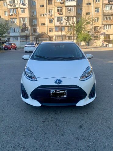 Toyota : 1.5 л | 2017 г. Седан