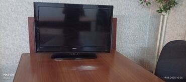 телевизор 40 дюймов skyworth: Черный телевизор Philips с плоским экраном и глянцевой поверхностью