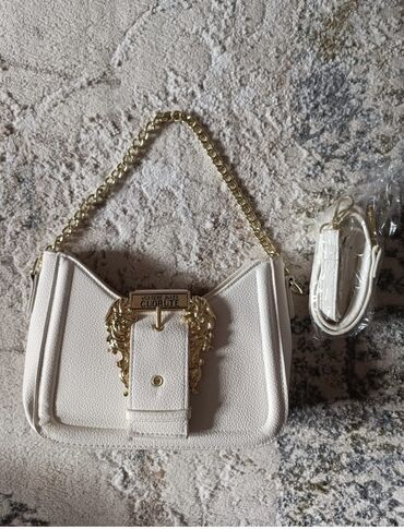 бабочки для декора: Ağ rəngli, qızılı detallar ilə bəzədilmiş qadın çantası. - Material