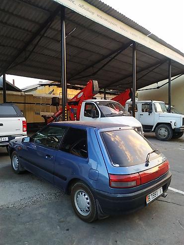 Mazda: Mazda 323: 1990 г., Механика, Бензин, Хэтчбэк — 4