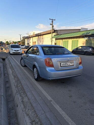 кузгуго машина: Daewoo Gentra: 2014 г., 1.5 л, Автомат, Бензин, Седан