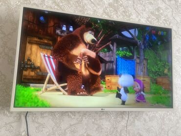 телевизор интернетом: Смарт-телевизор LG с тонкой белой рамкой. Модель оснащена функциями