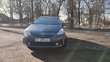 Toyota: Toyota Prius: 2012 г., Гибрид, Универсал — 2
