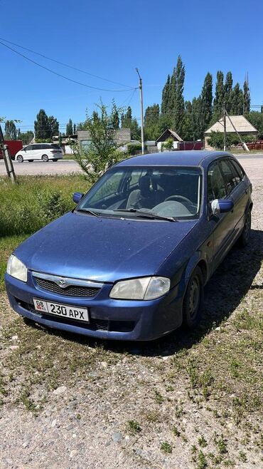 зеркало пассат: Mazda 323: 2000 г., 1.3 л, Механика, Бензин, Универсал
