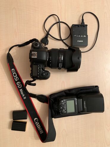 Fotokameralar: Canon 6D mark 2. 2300 azn Çox az işlənib 1 ilin kamerasıdır Heç bir