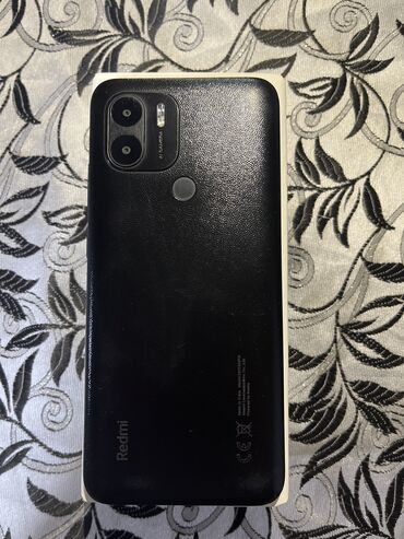 redmin a9: Xiaomi Redmi A1 Plus, 32 ГБ, цвет - Черный, 
 Кнопочный, Отпечаток пальца, Две SIM карты