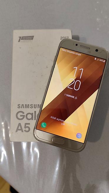 nokia yeni model: Samsung Galaxy A5 2017, 32 GB, rəng - Qızılı, Barmaq izi — 1