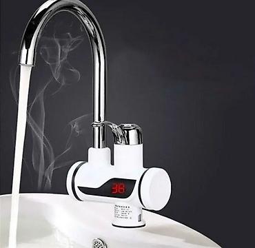 su kran: Elektrikli ani su qızdırıcısı suyu tez və asanlıqla tələb olunan — 2