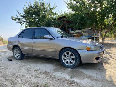 ремкомплект кулисы митсубиси спейс стар: Классический седан Toyota Corolla бежевого цвета, предназначенный для
