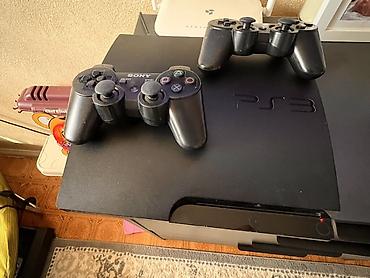 сони игравой: Игровая приставка Sony PlayStation 3 (PS3) Super Slim с двумя — 1