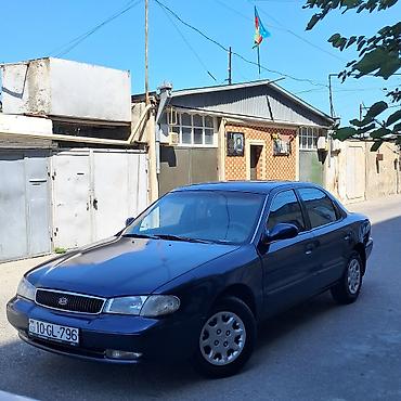 qəzali: Kia Clarus: 2 l | 1997 il Sedan — 1