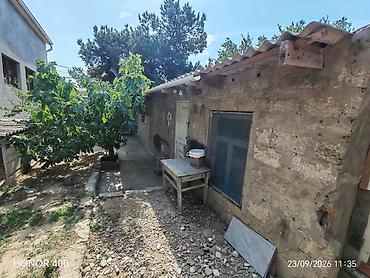 konteyner satışı: Qaraj və həyətyanı sahə ilə yardımçı tikil 1.36sotdu belediye senedi — 3