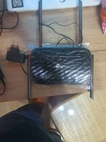 контроллеры raid adaptec: Беспроводной роутер TP-Link в черном корпусе с двумя внешними