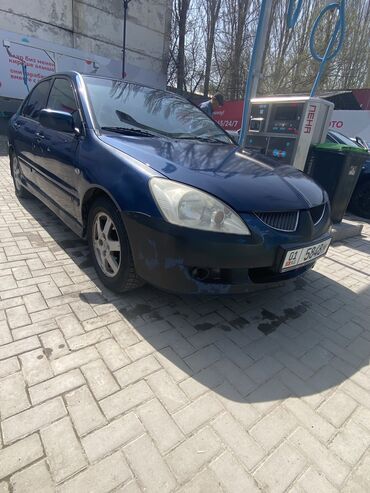 Установка на Mitsubishi Lancer сигнализации Pandora DX 40RS | Пандора Томск