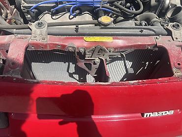 трехдверный: Mazda 323: 1990 г., Бензин, Купе — 4