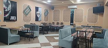 mebel skaflar: QALA Restoran – geniş və işıqlı zalı, rahat oturma qrupları və bar — 3