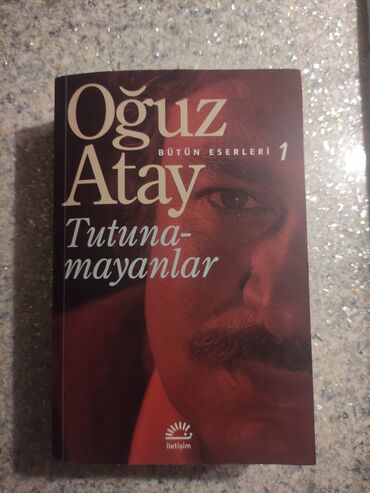 roman kitab: Oğuz Atay- Tutunamayanlar romanı. Tertemizdi ve hecbir zedesi yoxdu