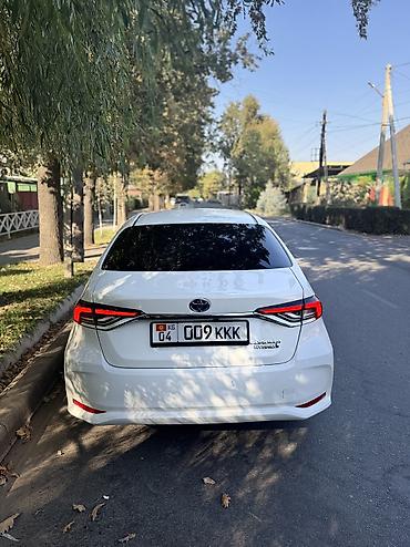 corolla 2016: Toyota Corolla: 2021 г., 1.8 л, Вариатор, Гибрид, Седан — 5