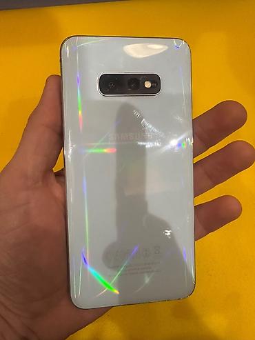 pleystein 4 pro: Samsung Galaxy S10e, 128 GB, rəng - Ağ, Simsiz şarj — 1
