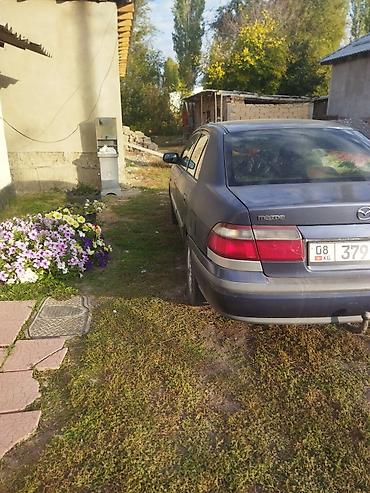 sprinter 516: Mazda 626: 1999 г., 1.8 л, Механика, Газ, Седан — 6