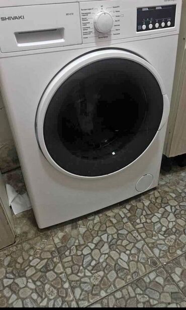 Ağ rəngli Shivaki markalı.9 kg liq. öndən yükləməli paltaryuyan maşın