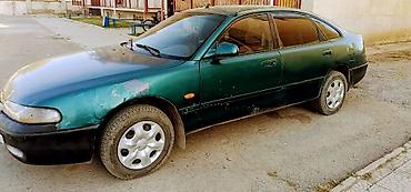 smart open: Mazda 626: 1992 г., 1.8 л, Механика, Бензин, Хэтчбэк — 2