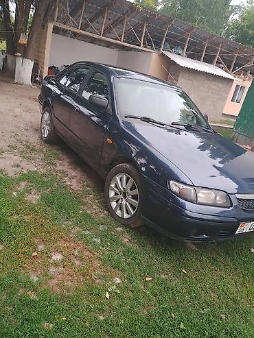 smart plus: Mazda 626: 1997 г., 1.8 л, Механика, Седан — 4