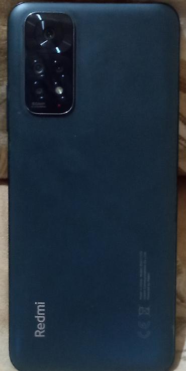 redmi 3 s: Redmi smartfon - Arxa paneldə “Redmi” loqosu və çoxmodullu kamera — 1