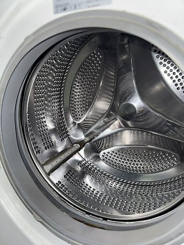 den 8: Стиральная машина LG, фронтальная загрузка, серия WD (на панели — 2