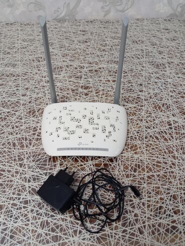 adsl wifi modem router: Tam saz vəziyyətdədir. TP-link modem. Model: TD-W8961N. 300Mbps