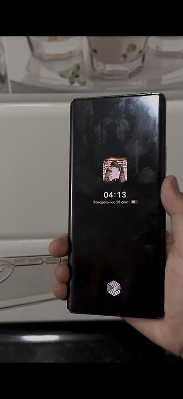 смартфоны vivo: Vivo X90, красный цвет (задняя панель под кожу). В комплекте — 2