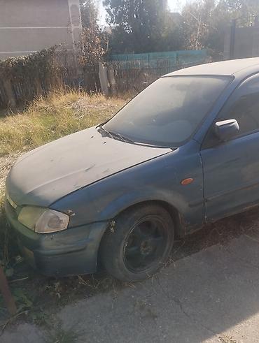 е 34 тарпеда сидения: Mazda 323: 2001 г., 1.6 л, Механика, Бензин, Универсал — 2