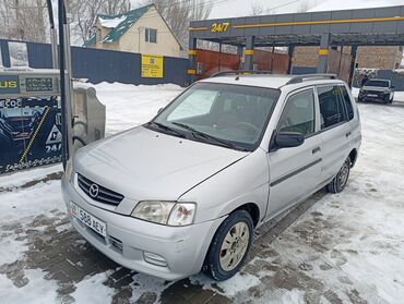 Mazda: Mazda Demio: 2002 г., 1.3 л, Механика, Бензин, Седан