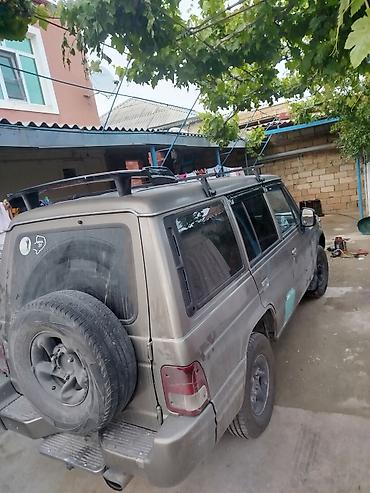 Digər avtomobillər: Off-road tipli 7 yerlik SUV - Kuzov: 5 qapılı, tavan relsləri və yan — 1